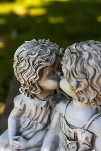 Kissing Kids Stone Effect Garden Ornament