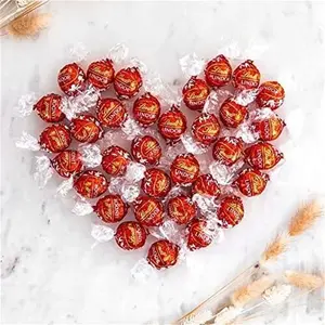 Lindt Lindor Milk Chocolate Truffles Bag - Approx 80 Balls, 1Kg - Chocolate Truffles With A Smooth Melting Filling - Sharing Pouch - Gift For Him Or