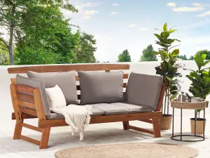 Garden Bench with Cushion PORTICI Wood Light Brown