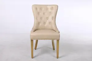 A Pair of Velvet Dining Chairs with Golden Legs in Grey