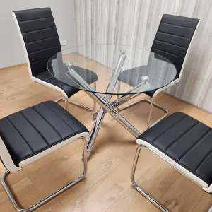 Round Chrome Metal and Clear Glass Dining Table and 4 Stylish Black White Faux Leather Dining Chairs Set