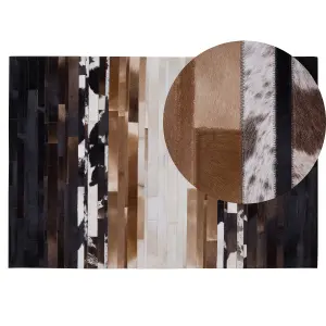 Cowhide Area Rug 140 x 200 cm Black and Beige DALYAN