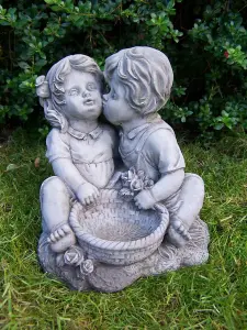 Charming Kissing Children with Flowerpot