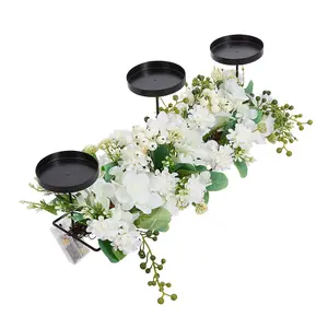 Wedding Decor Candlesticks with Faux Flowers and Warm Light