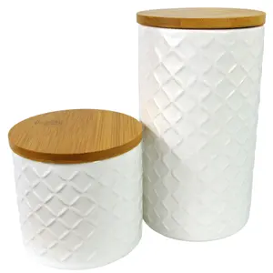 Set of Two Ceramic Jars Embossed Cream Canisters with Lids