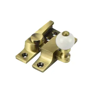 Sash Heritage Straight Arm Fastener with White Ceramic Knob (Standard) - Antique Brass