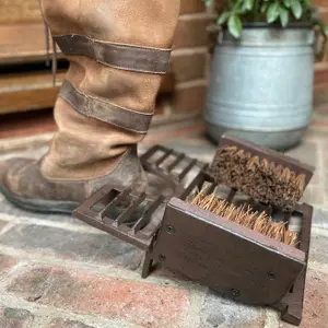 Cast Iron Boot Jack and Scraper with a Pair of Beetle Boot Jacks