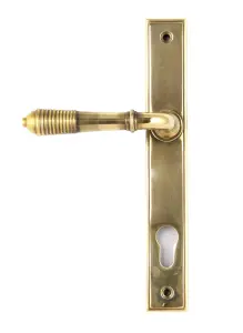 From The Anvil Aged Brass Reeded Slimline Lever Espag. Lock Set