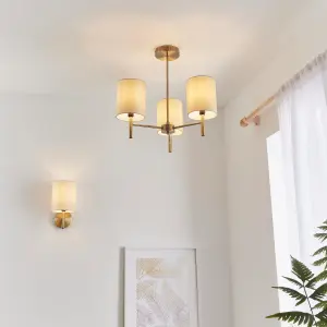 Anson Lighting Phoenix Wall light finished in Antique brass plate and cream fabric