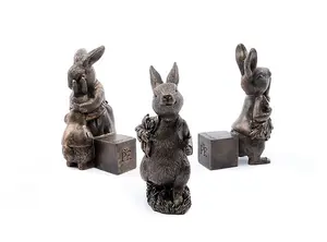 Beatrix Potter Bronze Peter Rabbit Plant Pot Feet - Set of 3 - Peter Eating Carrots, Running and Hugging - L6.5 x W8 x H11 cm