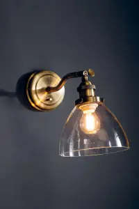 Anson Lighting Pampa Wall light finished in Antique brass plate and clear glass