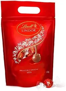 Lindt Lindor Milk Chocolate Truffles Bag - Approx 80 Balls, 1Kg - Chocolate Truffles With A Smooth Melting Filling - Sharing Pouch - Gift For Him Or