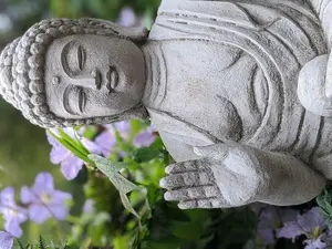 Small Buddha with Ball in Hand Garden Statue