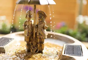 Solar Powered Boy & Girl Umbrella Water Fountain Rustic Traditional Water Feature