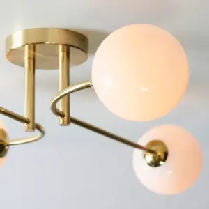 Anson Lighting Consort 4lt Semi Flush light finished in Satin brass plate and opal glass