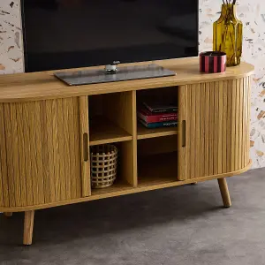 sweeek. 120cm scandi-style TV unit with grooved wooden-effect sliding doors Legacy Natural 120x40x57 cm